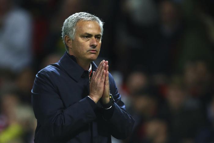 Manchester United's manager Jose Mourinho holds his hands together after the English League Cup soccer match between Manchester United and Manchester City at Old Trafford stadium in Manchester, England, Wednesday, Oct. 26, 2016. (ANSA/AP Photo/Dave Thompson) [CopyrightNotice: Copyright 2016 The Associated Press. All rights reserved.]